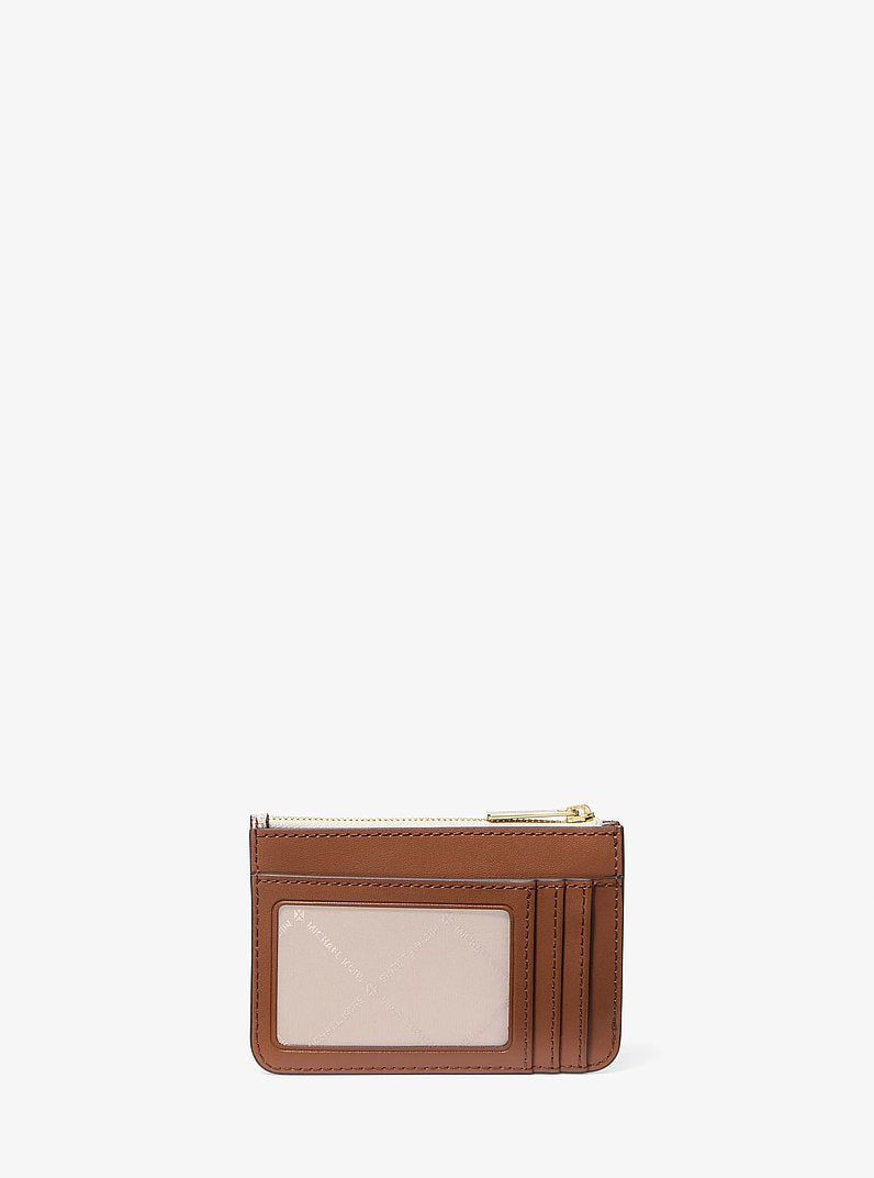 Porta-moedas Michael Kors Jet Set Travel Small Signature Logo Coin Purse, Lona com Logo Signature, cor Vanilla (Bege Claro), detalhe do material | Original Exports