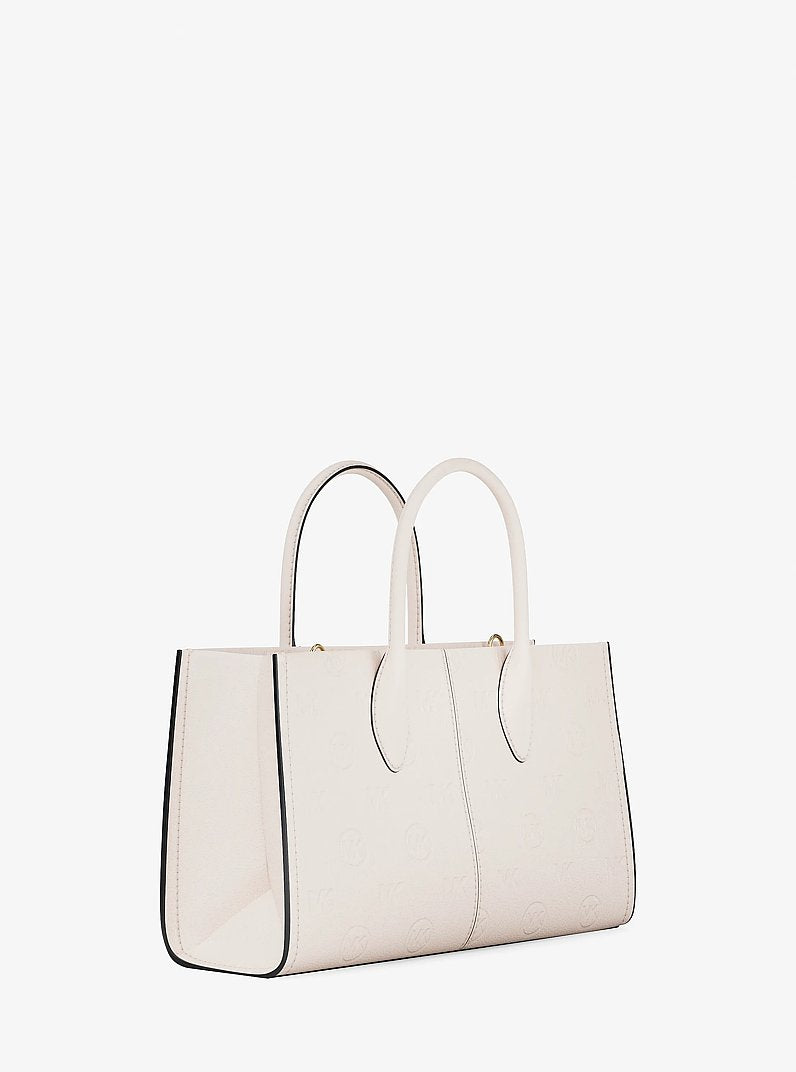Bolsa Michael Kors Mirella Medium Logo Debossed Satchel, Couro Vegano, cor Creme Claro, detalhe do material | Original Exports