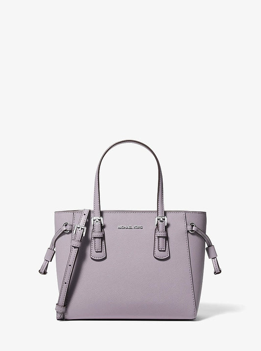 Michael Kors Voyager Extra-Small Pebbled Leather Convertible Crossbody Bag en Lilac — vista frontal | Original Export