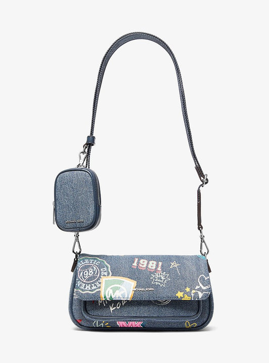 Michael Kors Jet Set Travel Small Embellished Denim Crossbody Bag With Pouch en Washed Denim — vista frontal | Original Export