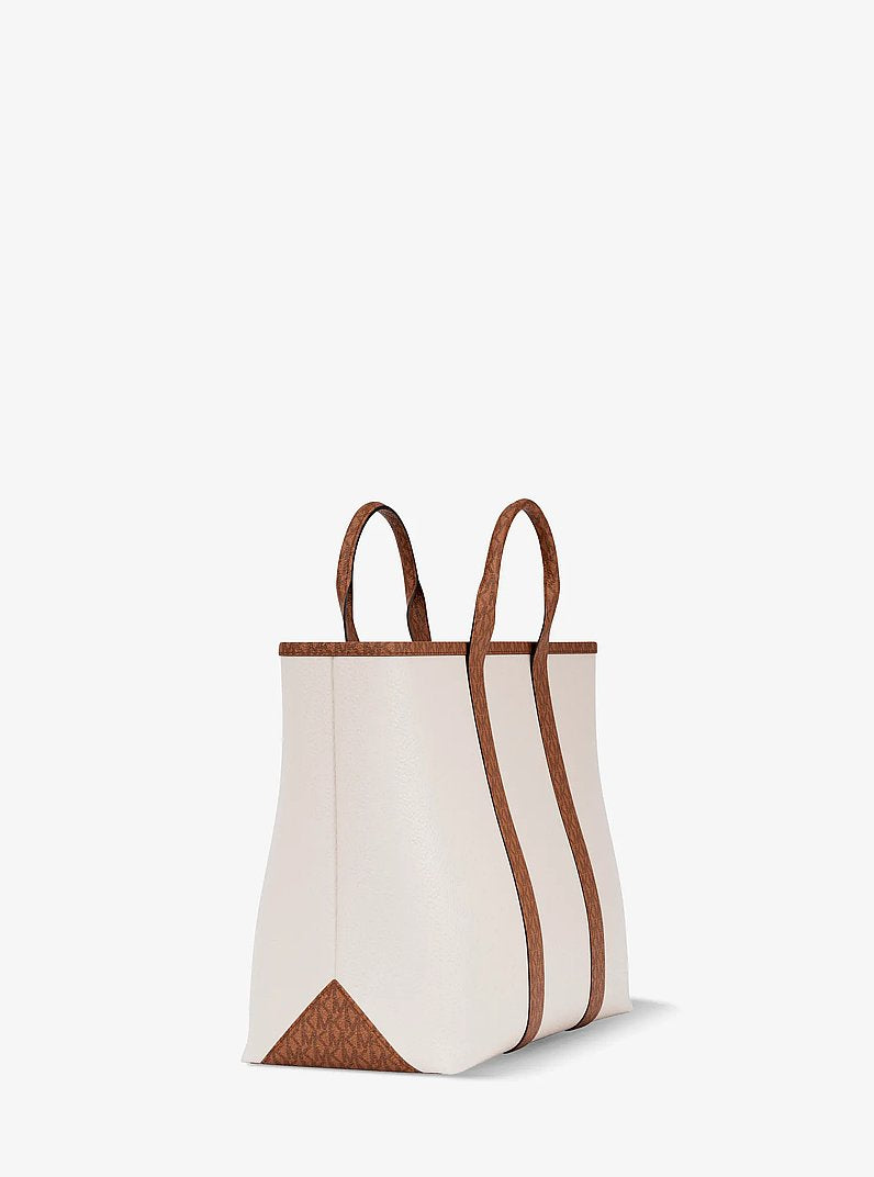 Bolsa Michael Kors Cooper Medium Pebbled Leather and Signature Logo Tote Bag, Couro Pebbled, cor Creme Claro/Luggage, detalhe do material | Original Exports